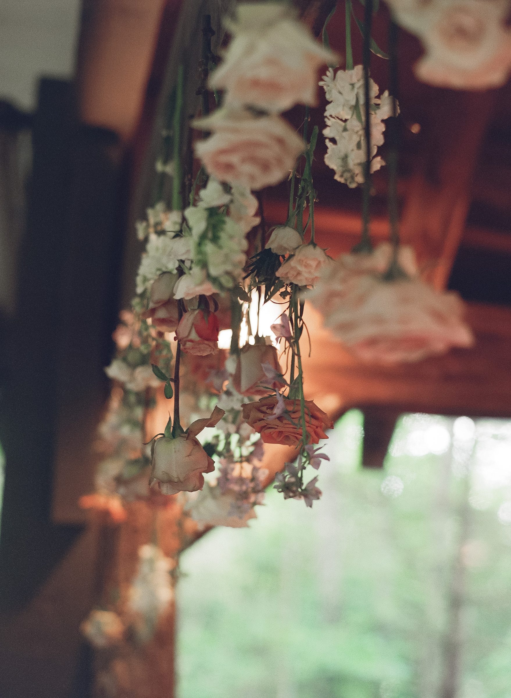 Hanging floral installation at a Mrs. Sugar Booger wedding — Highlands, NC