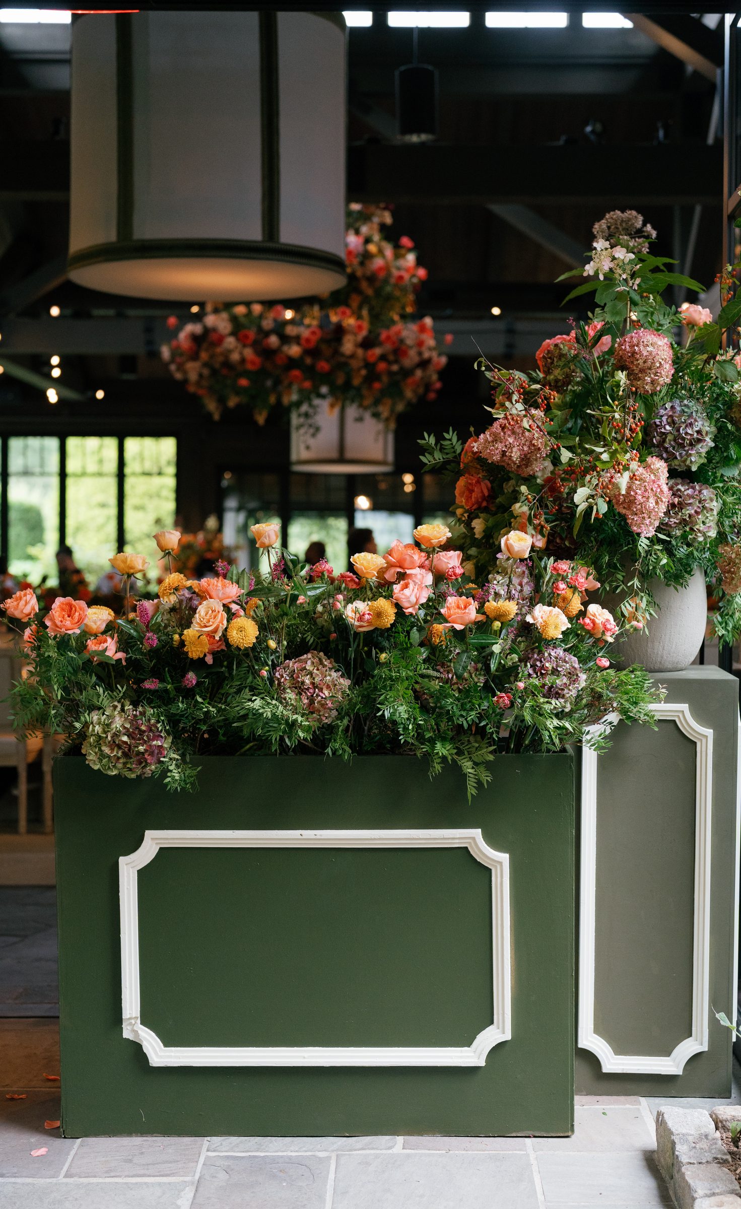 Colorful floral installation at a bespoke wedding by Mrs. Sugar Booger — Highlands, NC